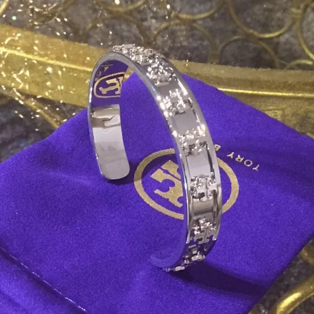 TORY BURCH RAISE LOGO SILVER OPEN CUFF BRACELET FITS MOST SIZES